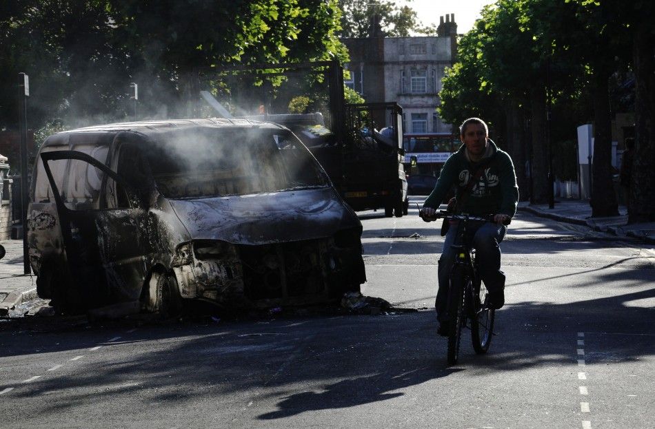 London Wakes to Ashes after Nights of Fiery Riots