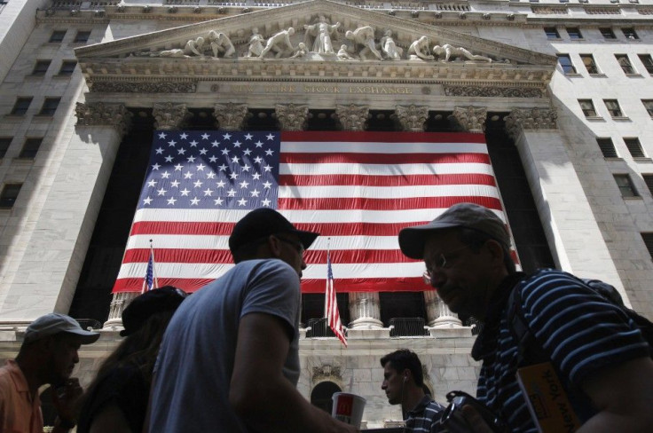 People walk outside the New York Stock Exchange