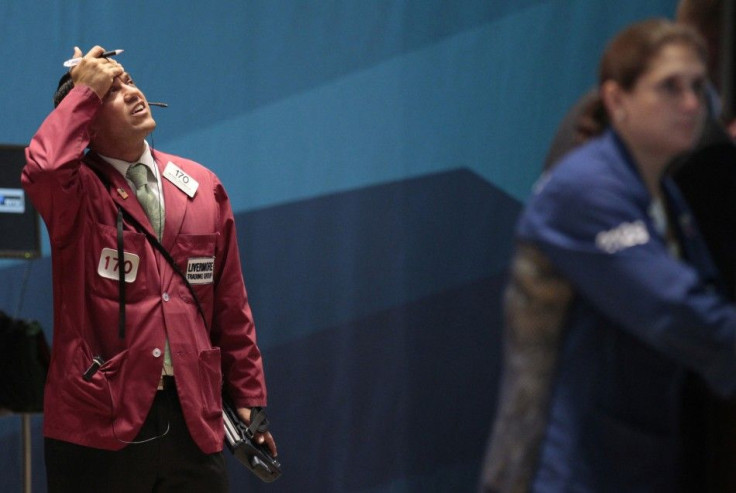 Traders work on the floor of the New York Stock Exchange