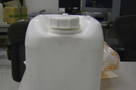 The chemical Gamma-Butyrolactone (GBL), used to make the date rape drug GHB, is shown in this plastic container in this undated photograph released by officials