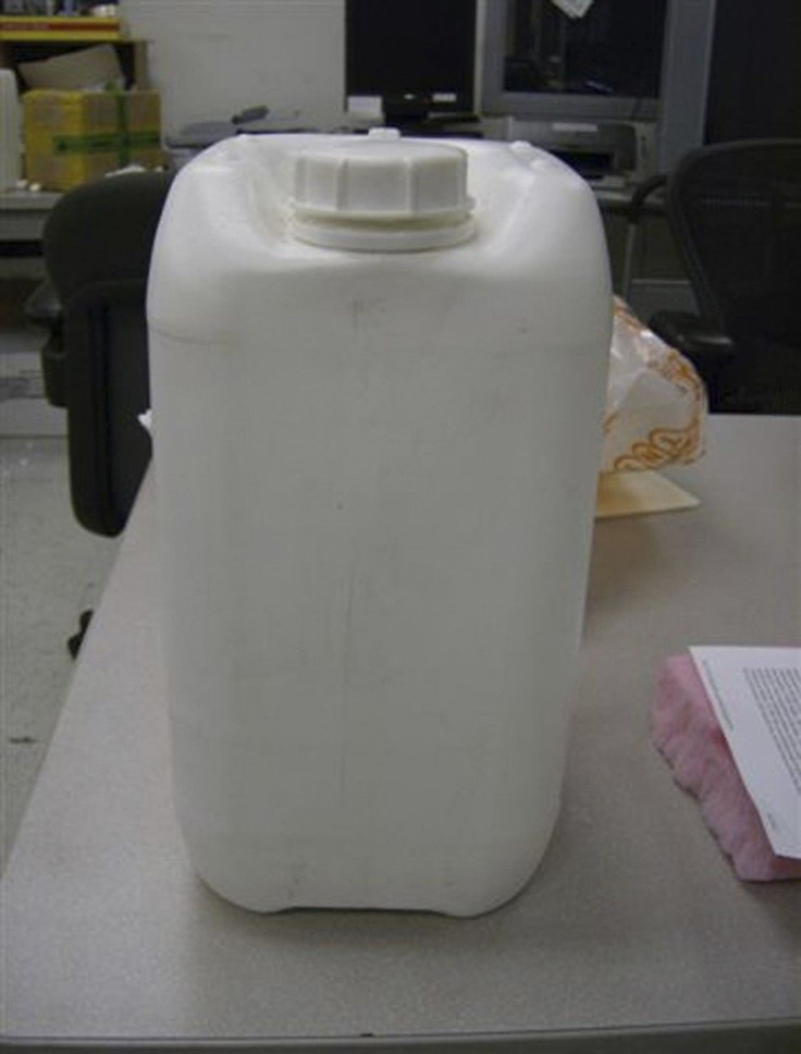 The chemical Gamma-Butyrolactone (GBL), used to make the date rape drug GHB, is shown in this plastic container in this undated photograph released by officials