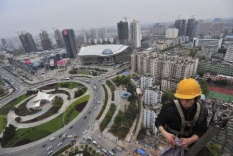China says price pressures peaking, risks remain