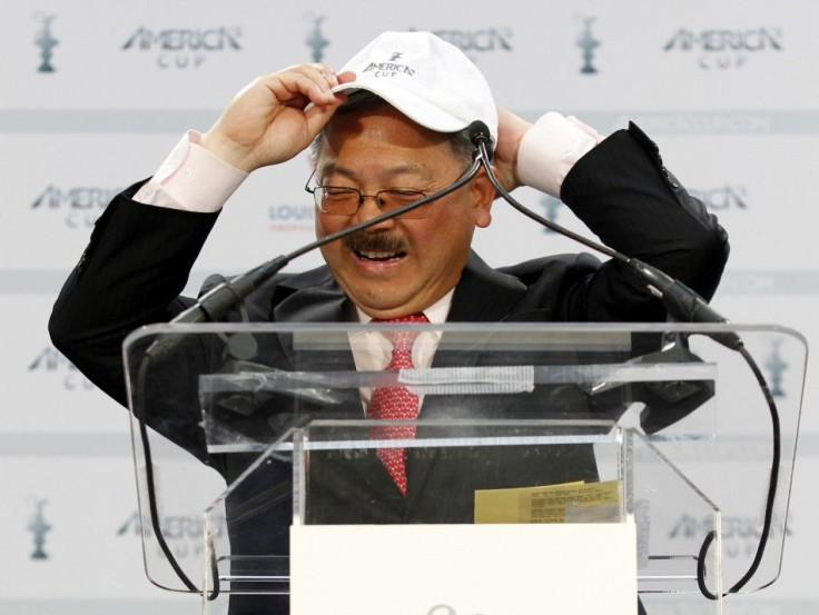 San Francisco Mayor Ed Lee dons an America&#039;s Cup cap during a news conference announcing the eight teams for the 2013 34th America&#039;s Cup at the Ferry Building in San Francisco June 15, 2011.