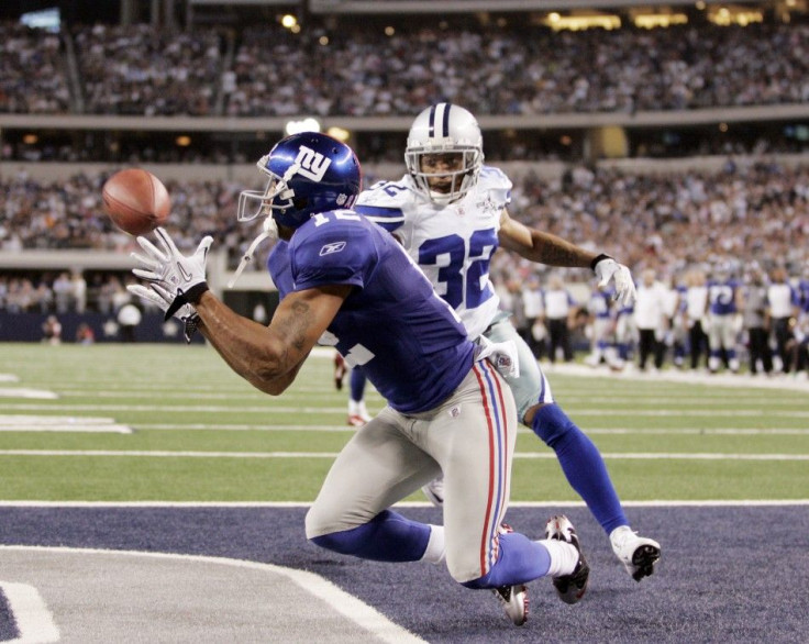 Smith catches a touchdown pass as Scandrick defends during the first half of their NFL football game in Arlington, Texas