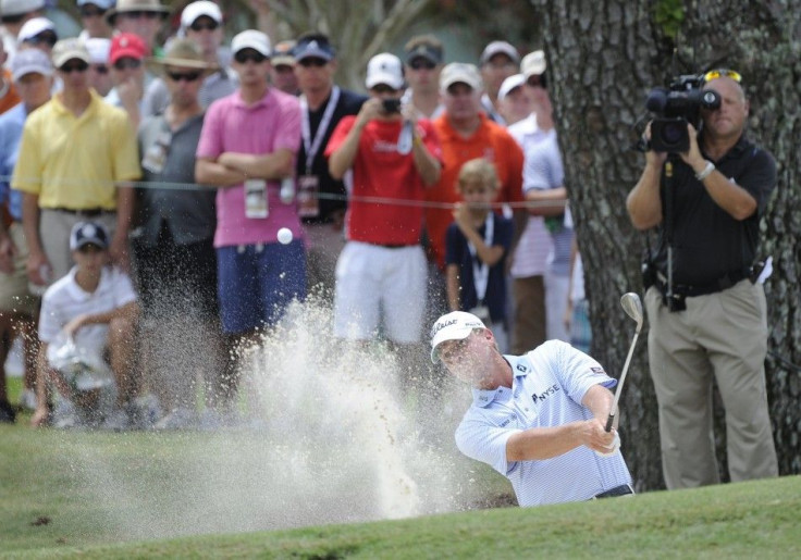 Steve Stricker of the U.S. hits from a bunker to the fifth green during the first round of the 93rd PGA Championship golf tournament at the Atlanta Athletic Club in Johns Creek