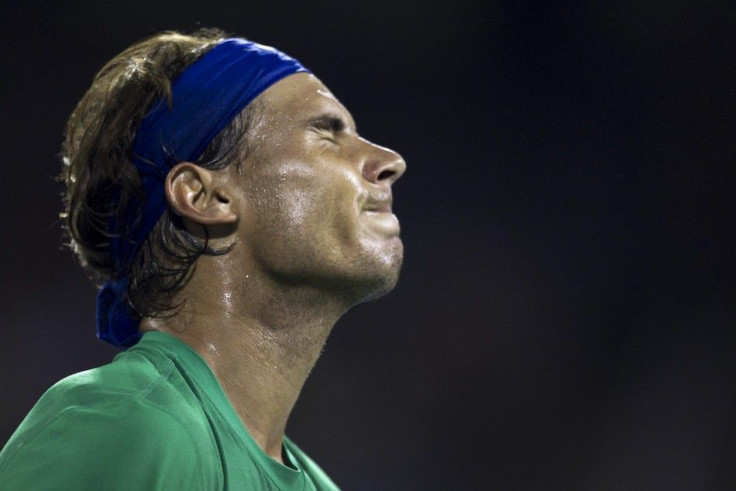 Spain's Nadal reacts during match against Croatia's Dodig at the Rogers Cup tennis tournament in Montreal