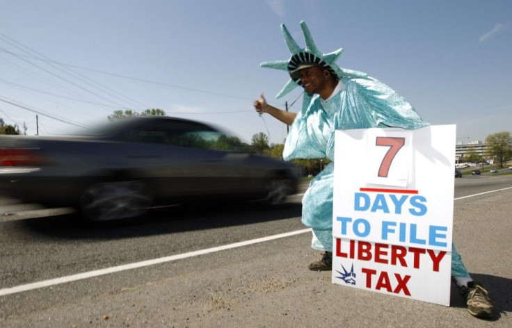 A man dressed as the statue of Liberty at a tax assistance business in northern Virginia