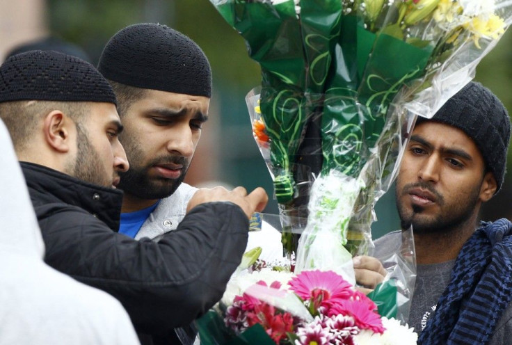 London Riots: The Face of Pain as Locals Pay Tributes to Victims