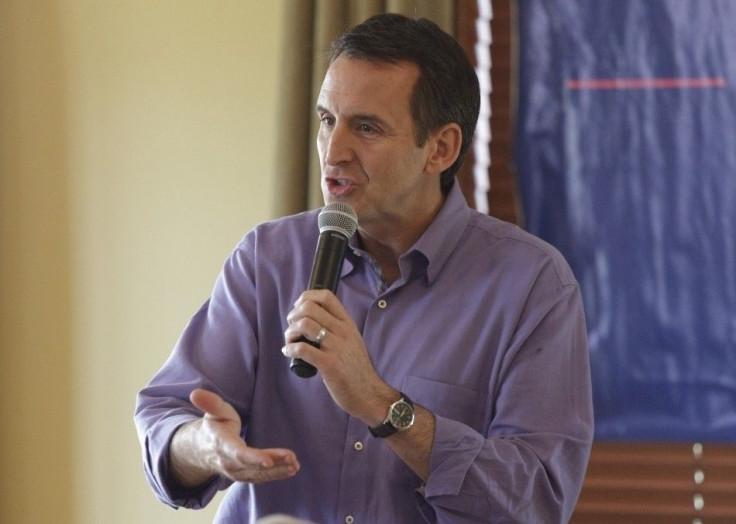 Former Minnesota Governor Pawlenty speaks at a town hall meeting at the Otter Creek Golf Course in Ankeny