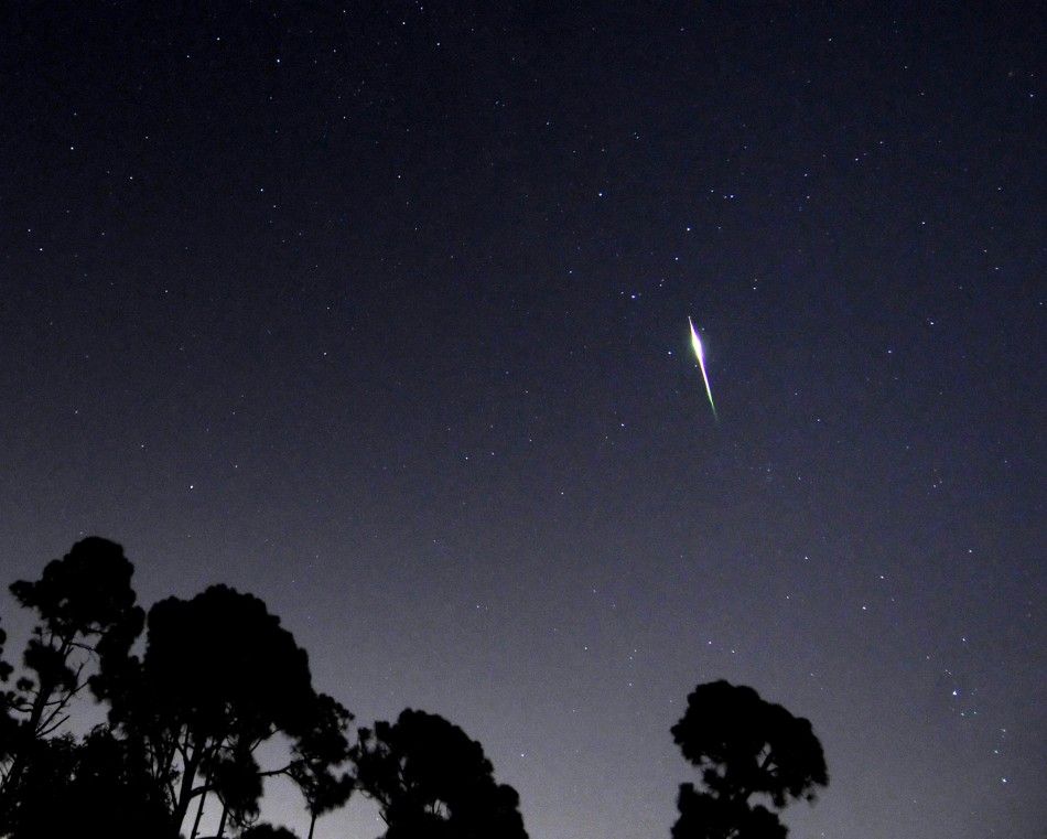 A Perseid meteor streaks above the skies of Palm Beach Gardens
