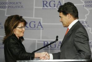 Governor Sarah Palin shakes hands with Gov. Rick Perry during a Plenary Session at the 2008 Republican Governors Association Annual Conference
