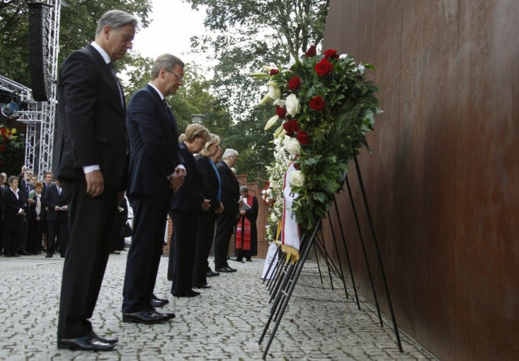 Berlin Mayor Wowereit, German President Wulff, Chancellor Merkel and State Premier Kraft attend wreath laying ceremony marking the 50th anniversary of the building of the Berlin Wall in Berlin