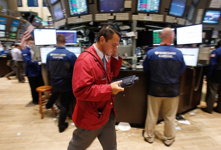 A trader works on the floor of the New York Stock Exchange in New York