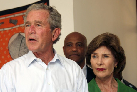 George W. Bush and Laura Bush arrive at Mnazi Mmoja Hospital to see the government efforts in the prevention of transmission of HIV/AIDS in Tanzania's capital Dar es Salaam
