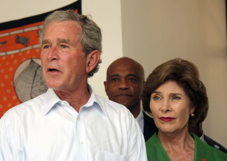 George W. Bush and Laura Bush arrive at Mnazi Mmoja Hospital to see the government efforts in the prevention of transmission of HIV/AIDS in Tanzania's capital Dar es Salaam