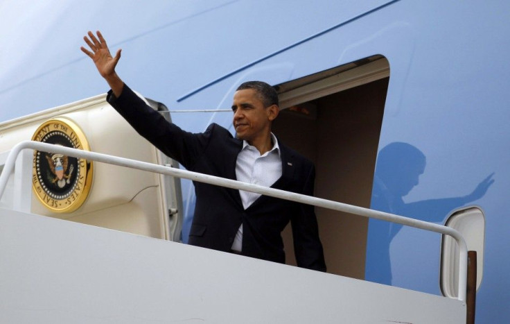 U.S. President Barack Obama steps aboard Air Force One 