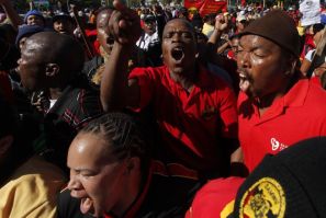 Striking South African municipal workers march through the streets of Cape Town