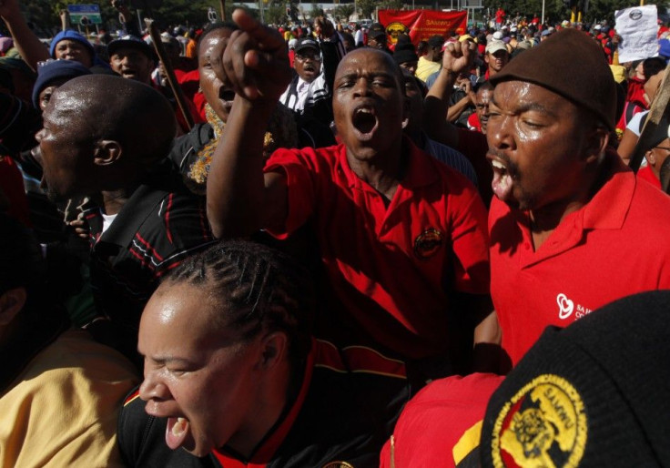 Striking South African municipal workers march through the streets of Cape Town