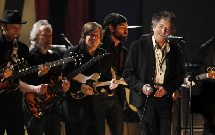 Bob Dylan performs "Maggie's Farm " at the 53rd annual Grammy Awards in Los Angeles