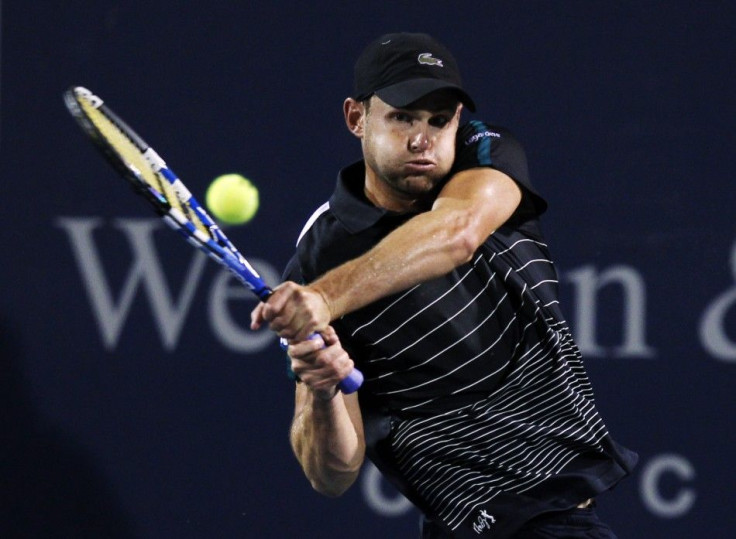 Roddick of the U.S. hits a return to Kohlschreiber of Germany during their first round match of the Cincinnati Open tennis tournament in Cincinnati