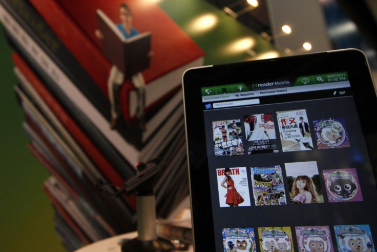 An Apple iPad 2 is pictured showing a library through a software application at the Hong Kong Book Fair