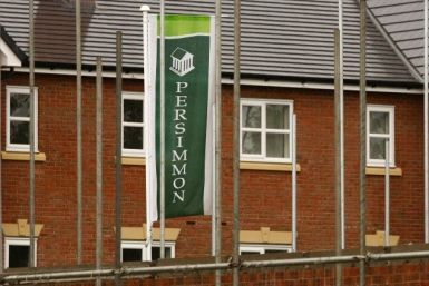 A Persimmon banner flies at a housing development near Manchester