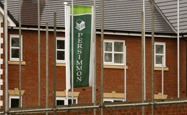 A Persimmon banner flies at a housing development near Manchester