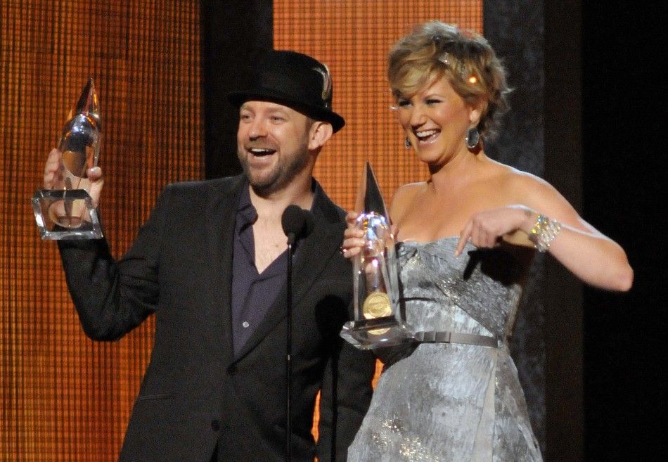 Sugarland accepts the Vocal Duo of the Year award at the annual Country Music Association Awards in Nashville