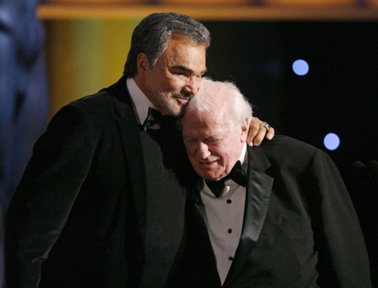 Actor Burt Reynolds hugs Charles Durning after he accepted the Lifetime Achievement award at the 14th annual Screen Actors Guild Awards in Los Angeles