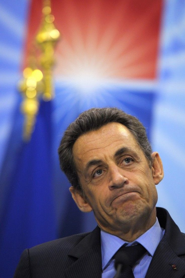 Sarkozy addresses reporters at the G20 and G8 summit
