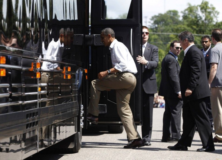 U.S. President Obama steps aboard his bus in Cannon Falls