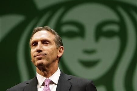 Starbucks CEO Howard Schultz speaks to shareholders at the company&#039;s annual meeting of shareholders in Seattle, Washington