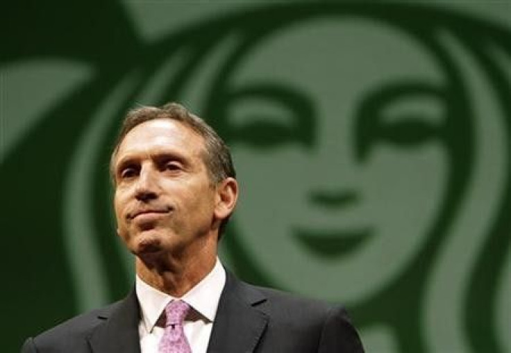 Starbucks CEO Howard Schultz speaks to shareholders at the company&#039;s annual meeting of shareholders in Seattle, Washington