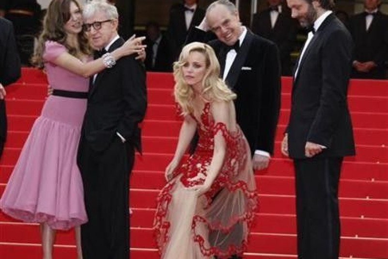 Director Woody Allen (2nd L) arrives with cast members Lea Seydoux (L), Rachel McAdams (C) and Michael Sheen (R) for the screening of ''Midnight In Paris'' and for the opening ceremony of the 64th Cannes Film Festival in Cannes