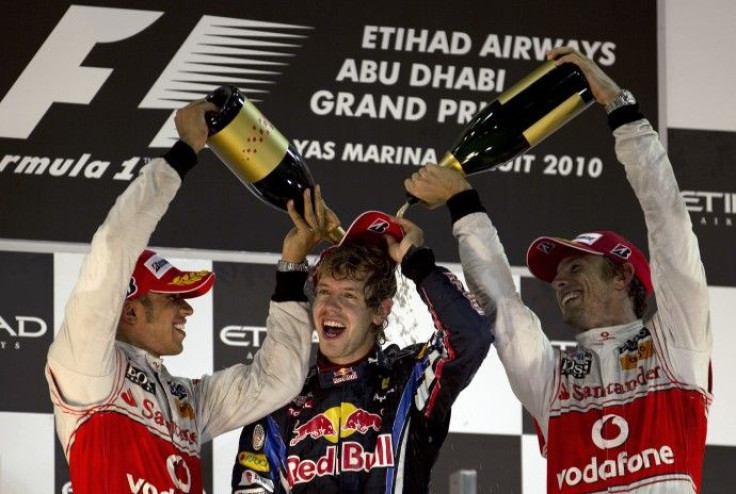Red Bull Formula One driver Sebastian Vettel of Germany celebrates his championship and Grand Prix win in Abu Dhabi.