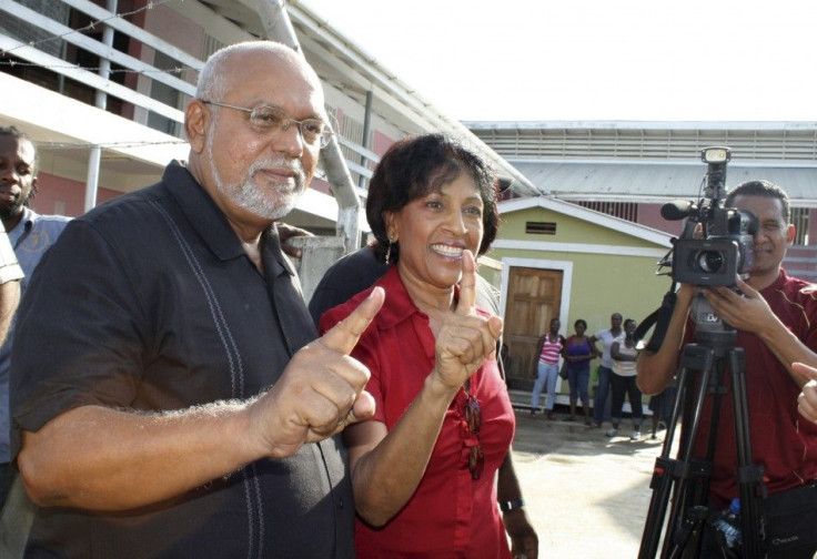 Donald Ramotar, Presidential Candidate of incumbent People&#039;s Progressive Party/Civic (PPP/C) shows his inked finger after casting his vote