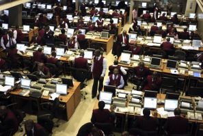 Brokers work on the trading floor of the Nigerian stock exchange in the commercial capital Lagos