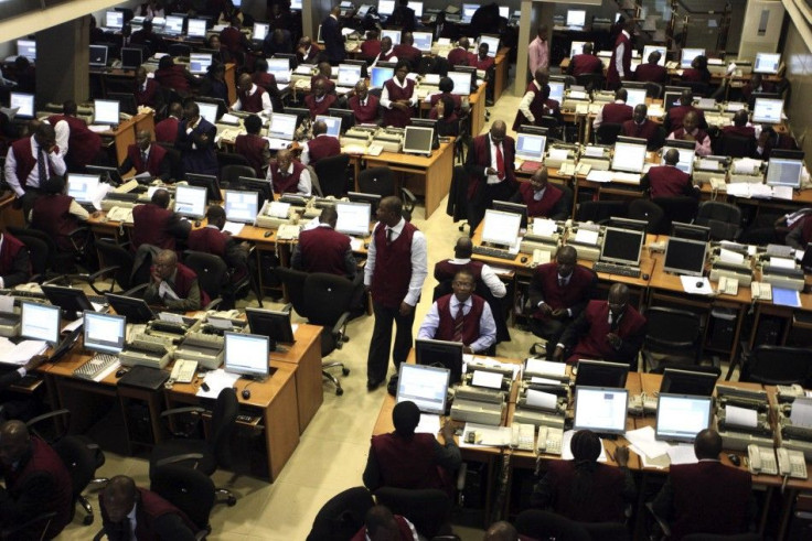 Brokers work on the trading floor of the Nigerian stock exchange in the commercial capital Lagos