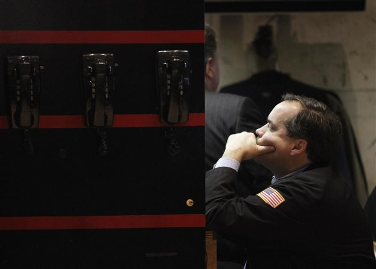 Traders work on the floor of the New York Stock Exchange