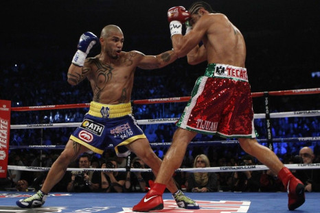Miguel Cotto battles Antonio Margarito during their WBA Junior Middleweight Championship boxing match in New York on Dec. 4, 2011.