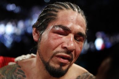 Margarito of Mexico reacts after his fight against Cotto of Puerto Rico was stopped due to an injury, in their WBA World Junior Middleweight championship boxing match in New York