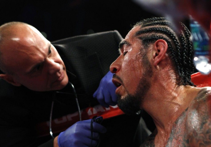 Margarito of Mexico reacts after his fight against Cotto of Puerto Rico was stopped due to an injury, in their WBA World Junior Middleweight championship boxing match in New York