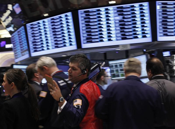 Trader John Panin works on the floor of the New York Stock Exchange