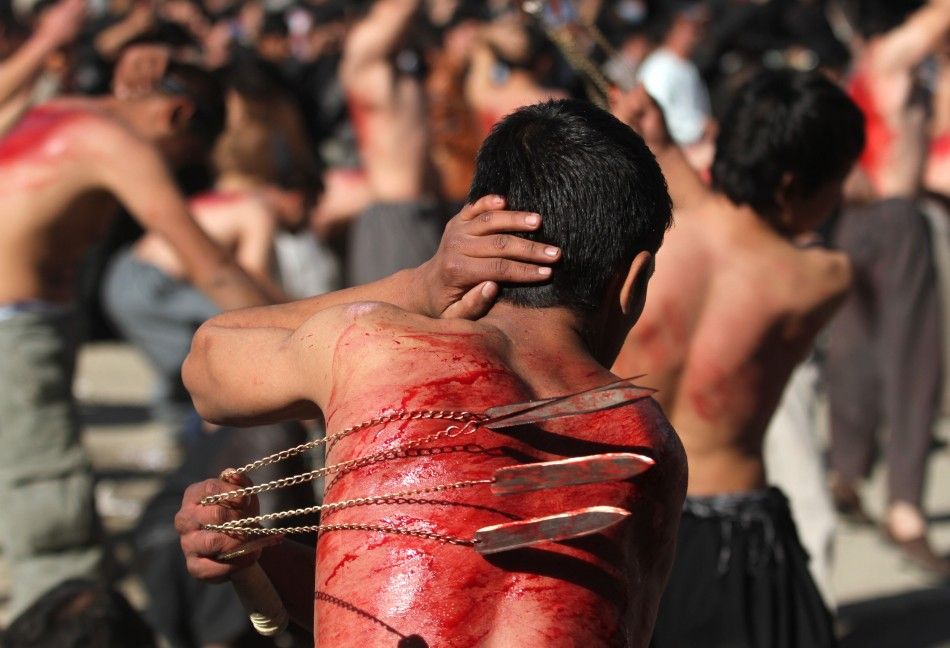 Shia Muslims Practice Self-Flagellation and Walk on Fire Prior to Ashura 