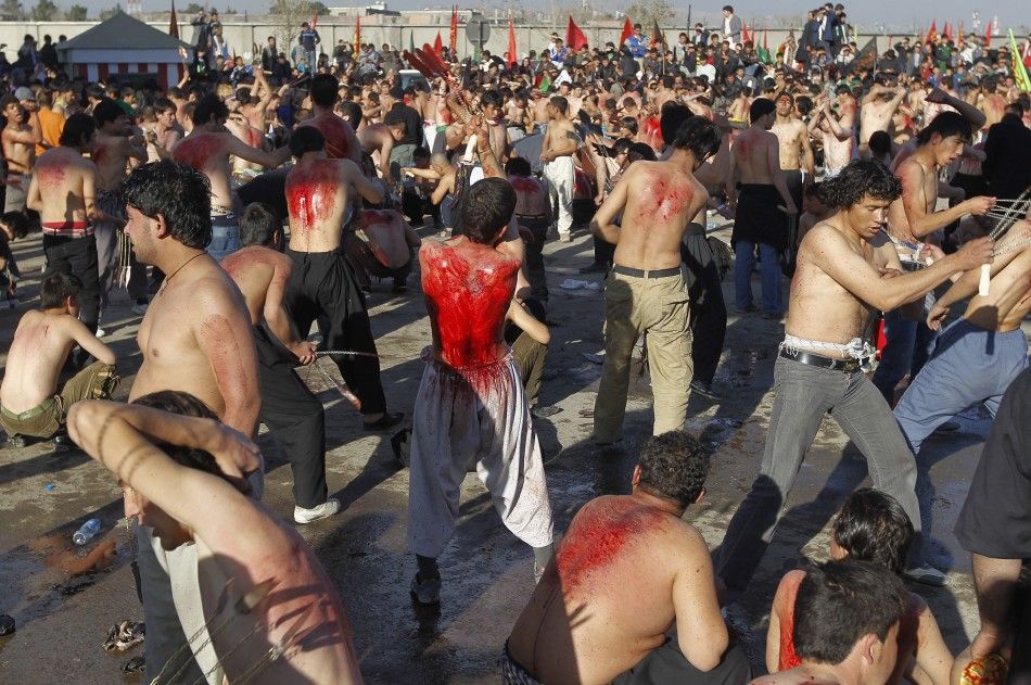 Shia Muslims Practice Self-Flagellation and Walk on Fire Prior to Ashura 