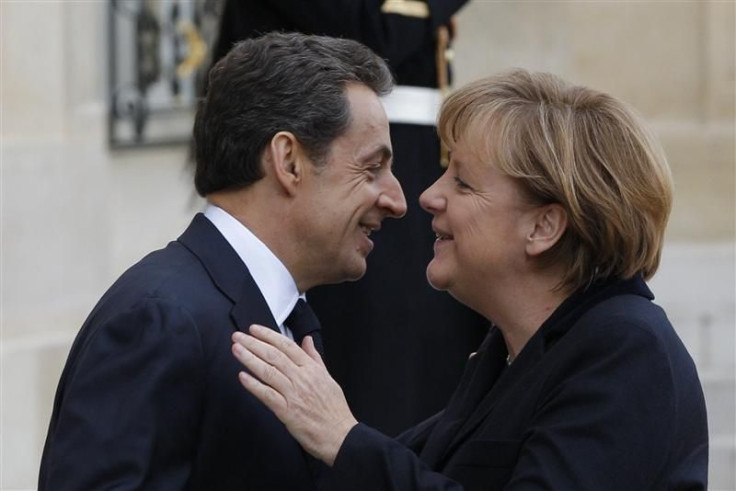 France&#039;s President Sarkozy greets German Chancellor Merkel at the Elysee Palace in Paris