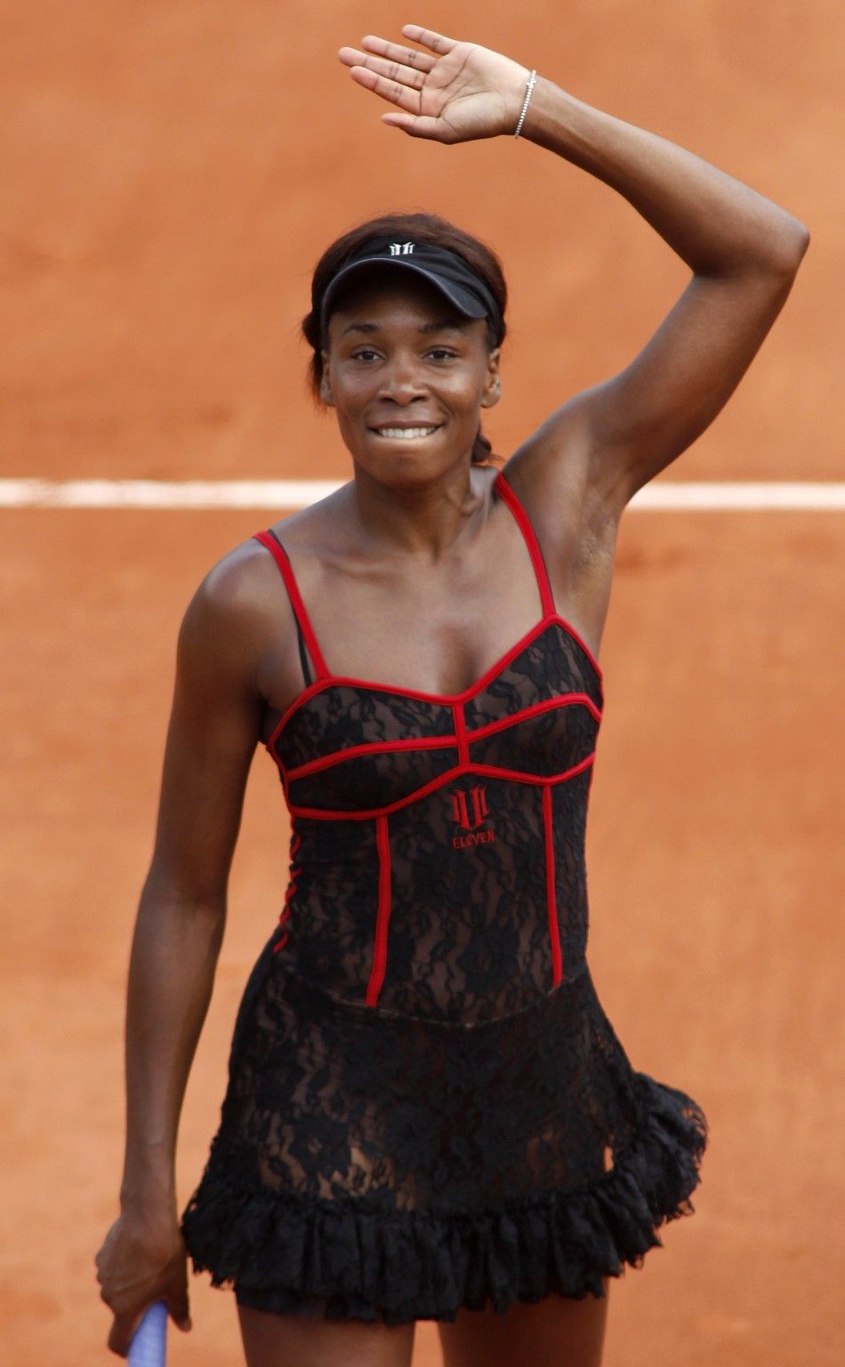 Venus Williams Wears a Red and Black Bodice 