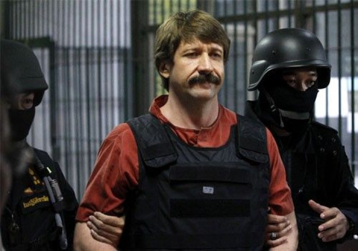 Suspected Russian arms dealer Viktor Bout is escorted by members of a special police unit after a hearing at a criminal court in Bangkok October 5, 2010. 