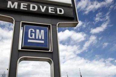 A GM sign is seen outside the Medved General Motors car dealership in Arvada, Colorado