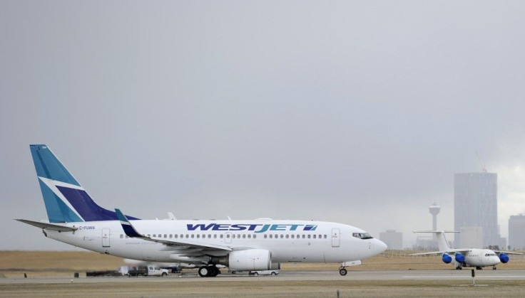 WestJet warns later bookings to hold back revenue